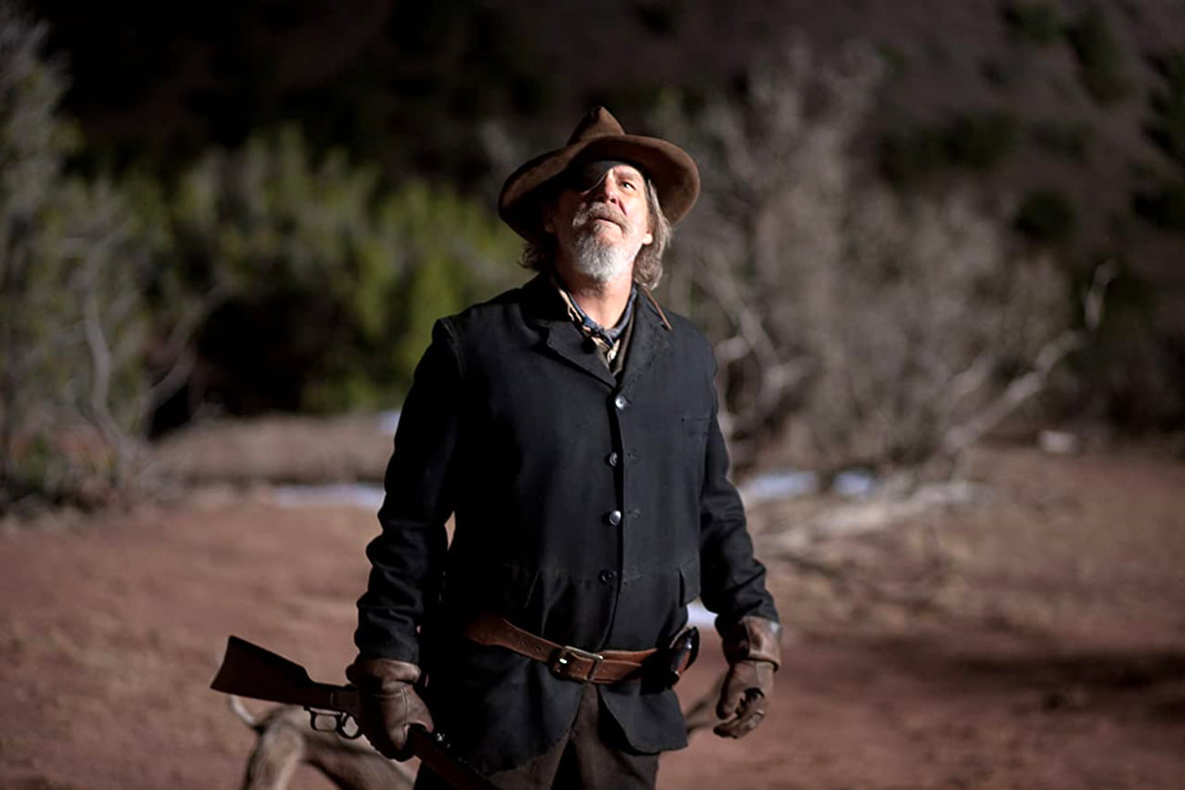 Jeff Bridges como Rooster Cogburn em Bravura Indômita
