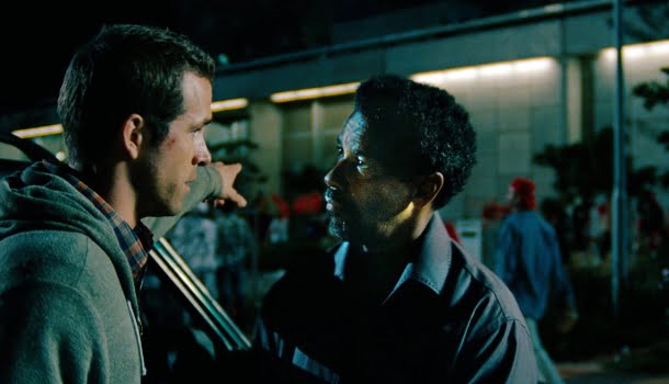 Filme frenético com Denzel Washington e Ryan Reynolds, na Netflix, vai virar seus olhos do avesso